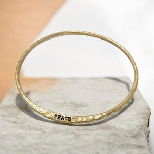 Gold 'Peace' Hammered Bangle Bracelet - Women's Jewelry